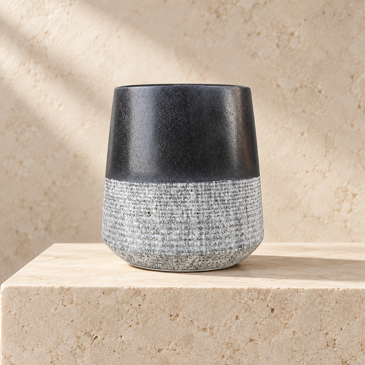 Black marble tumbler with textured lower finish