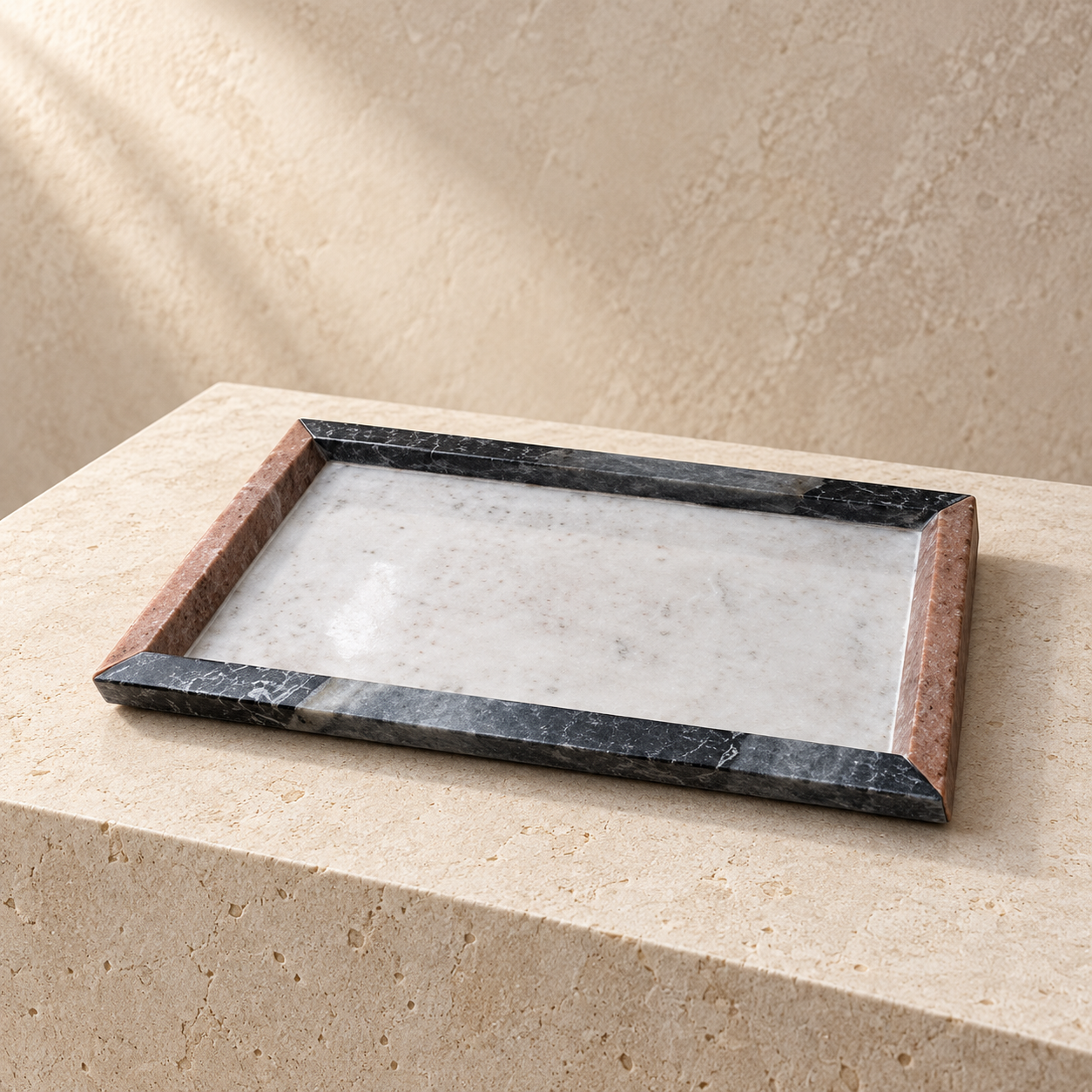 Two-tone rectangular marble tray with dark and pink-toned border