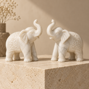 Pair of hand-carved V White marble elephant figurines