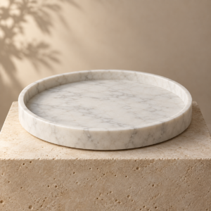Round V White marble serving tray in a premium neutral setting